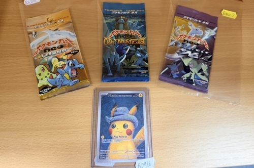 Unopened Japanese booster packs and the Van Gogh Museum Pikachu.